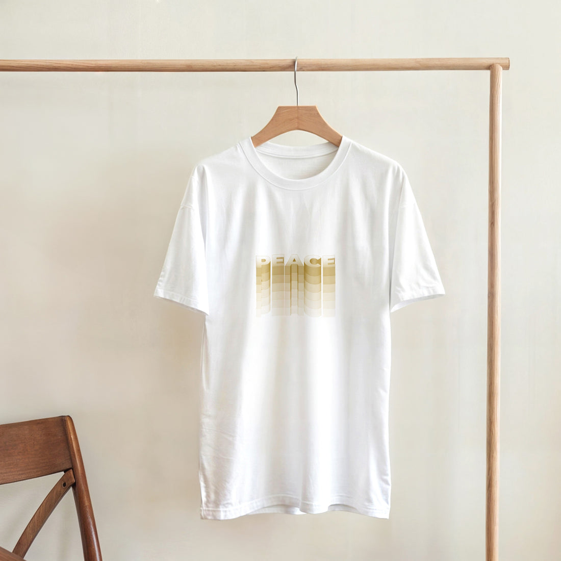 CAMISETA PAZ DORADA